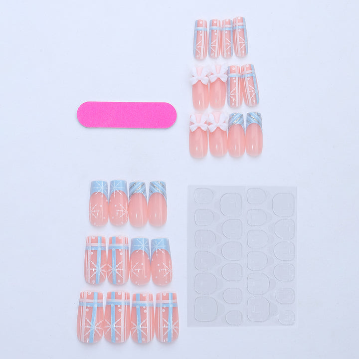 Artificial nail set with winter snowflake and bow motifs Stornfield
