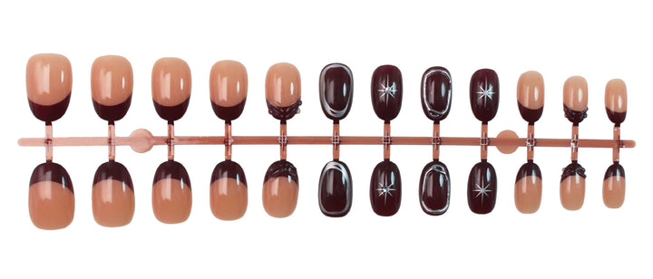 Acrylic nail set with elegant gradient and delicate embellishments Stornfield
