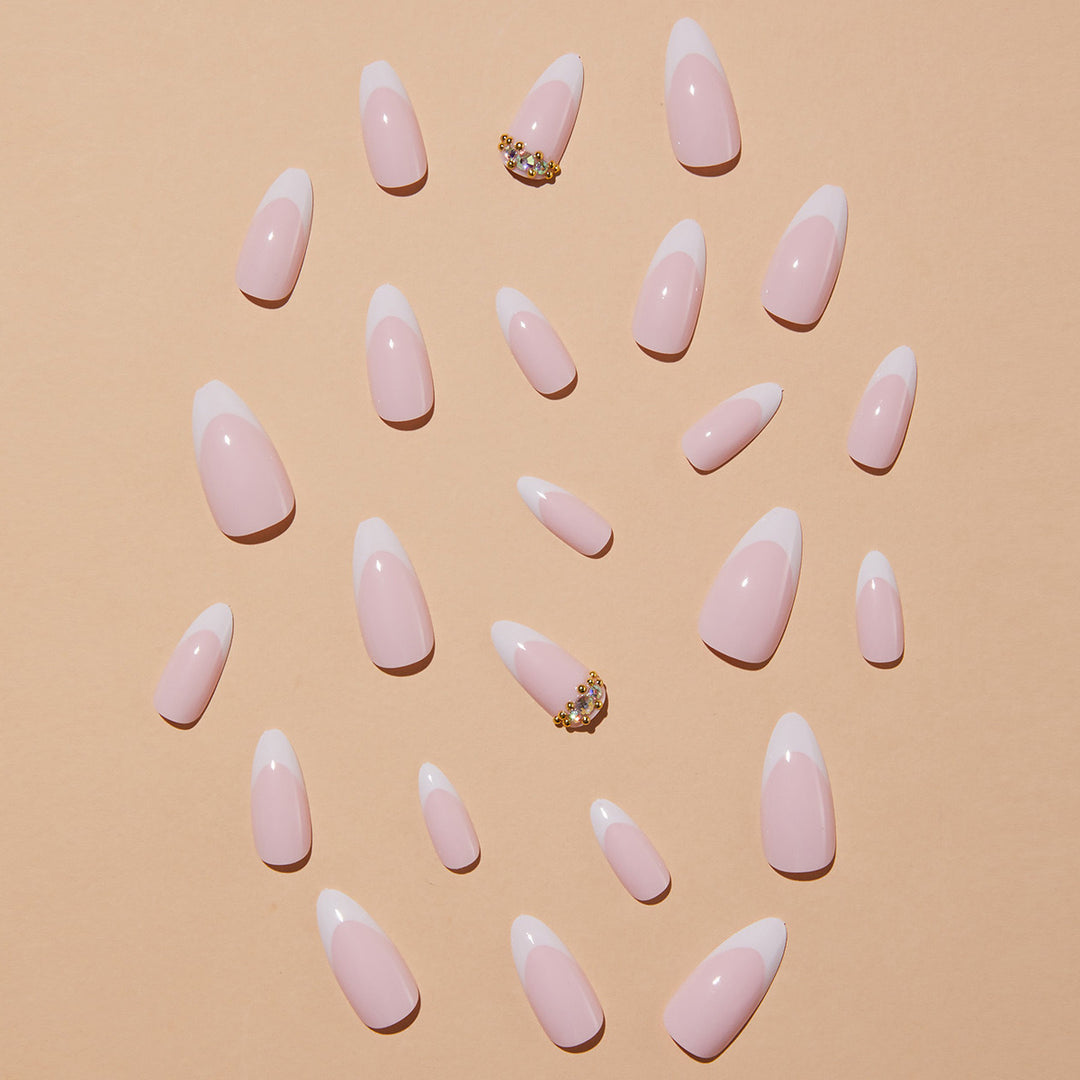 Elegant artificial nails with stylish French design and glitter accents Stornfield