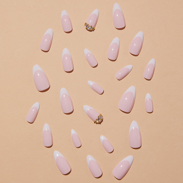 Elegant artificial nails with stylish French design and glitter accents Stornfield