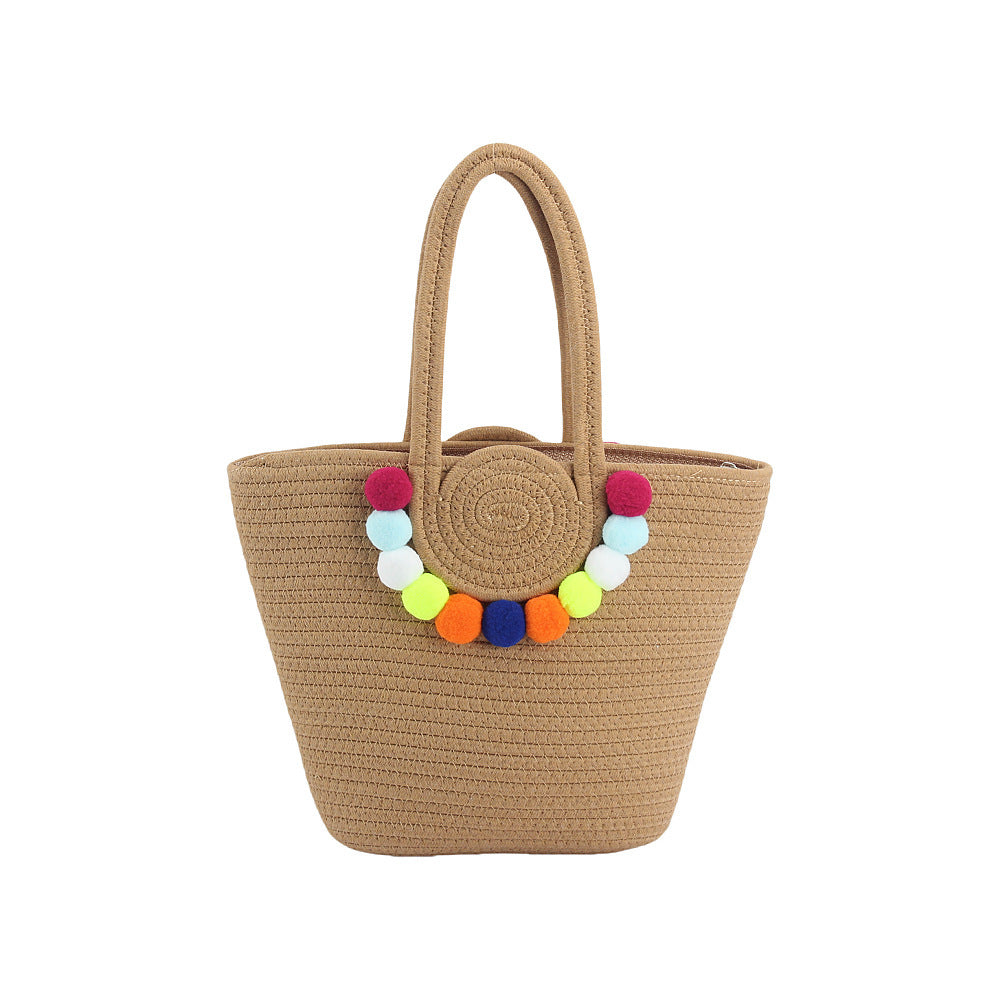 Beach bag with cheerful pom poms Stornfield