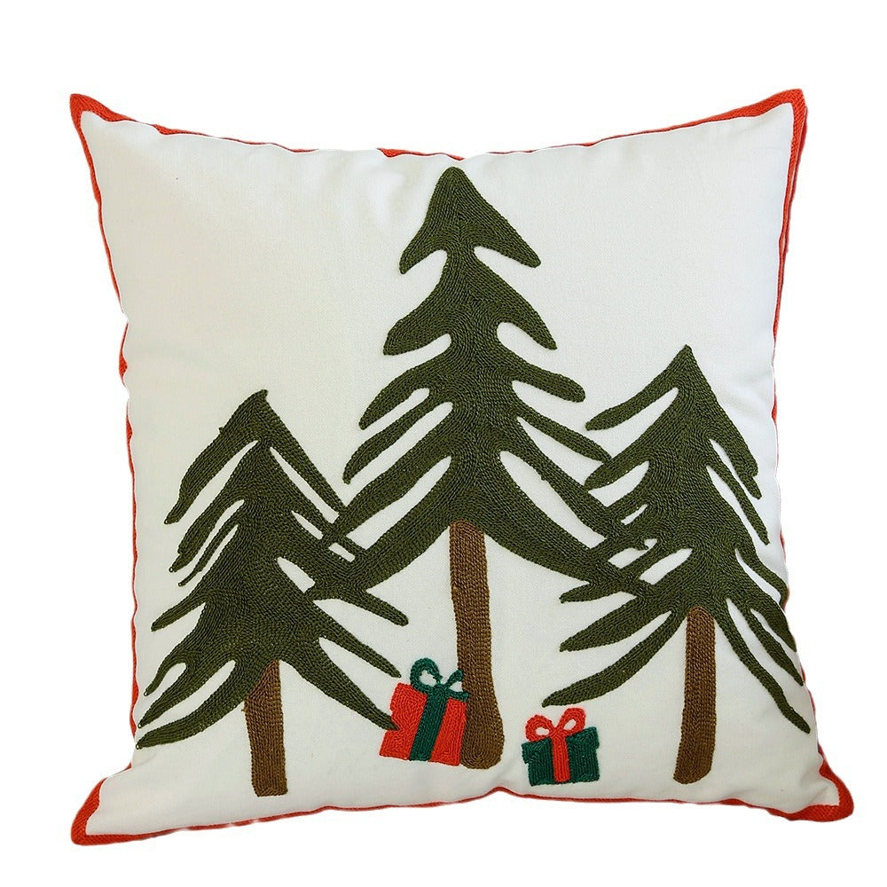 Decorative cushion cover with festive Christmas star print and pom-pom trim Stornfield