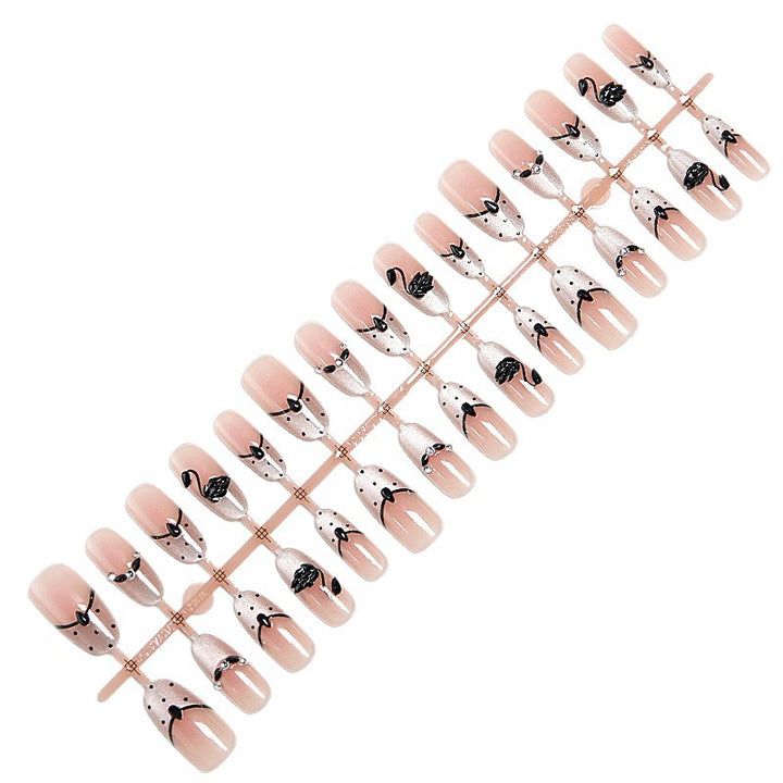 Artificial nails with floral accents and elegant shine Stornfield