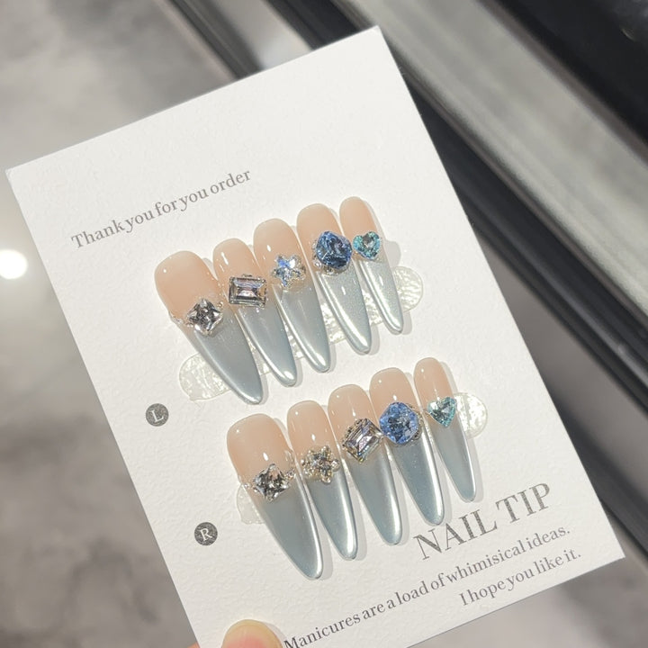 Glamorous artificial nails with sparkling stones Stornfield