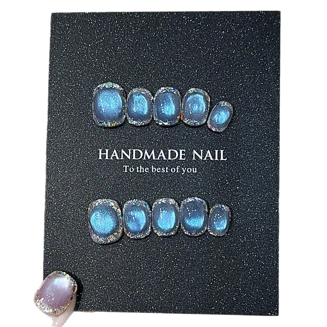 Handmade art nails with shimmering effects Stornfield