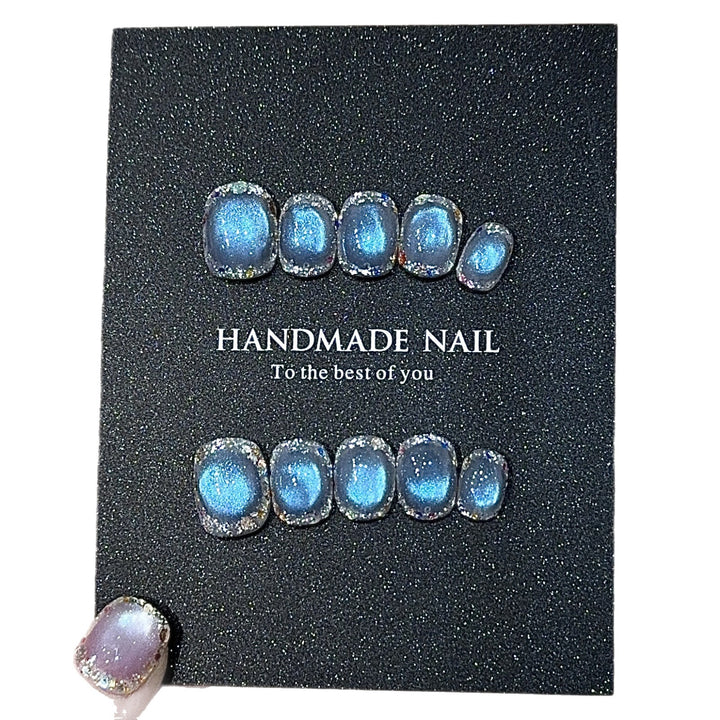 Handmade art nails with shimmering effects Stornfield