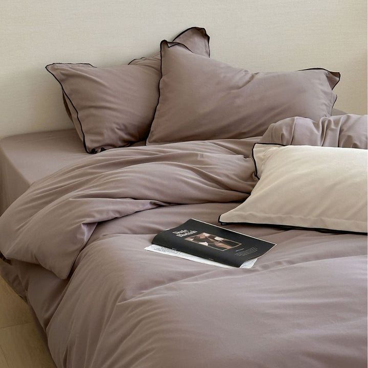 Reversible Cotton Sateen Duvet Cover Set with Contrast Piping and Pillow Shams