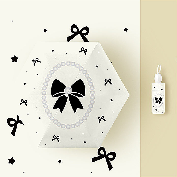 Ladies' kid-friendly folding umbrella with fun rabbit design Stornfield