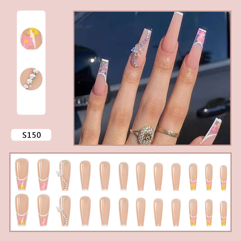 Artificail nail tips in elegant French design with floral accent Stornfield