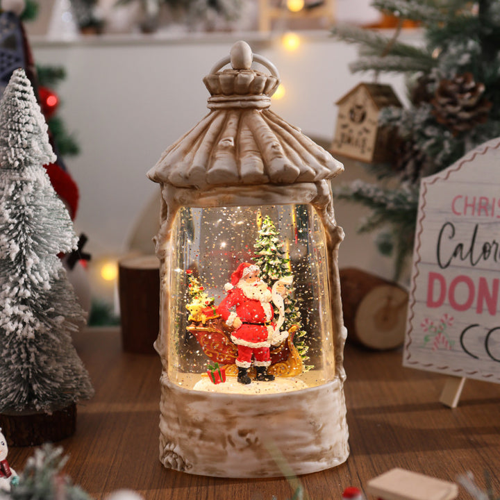 Illuminated Christmas lantern with snow scenes Stornfield