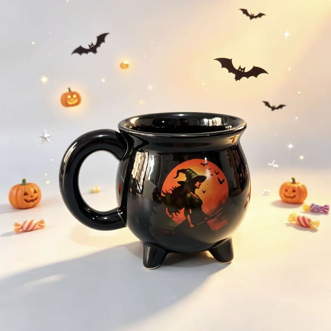 Ceramic kettle mug with star and planet decor