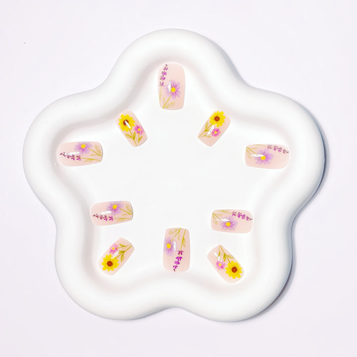 Glittering artificial nails with floral patterns Stornfield