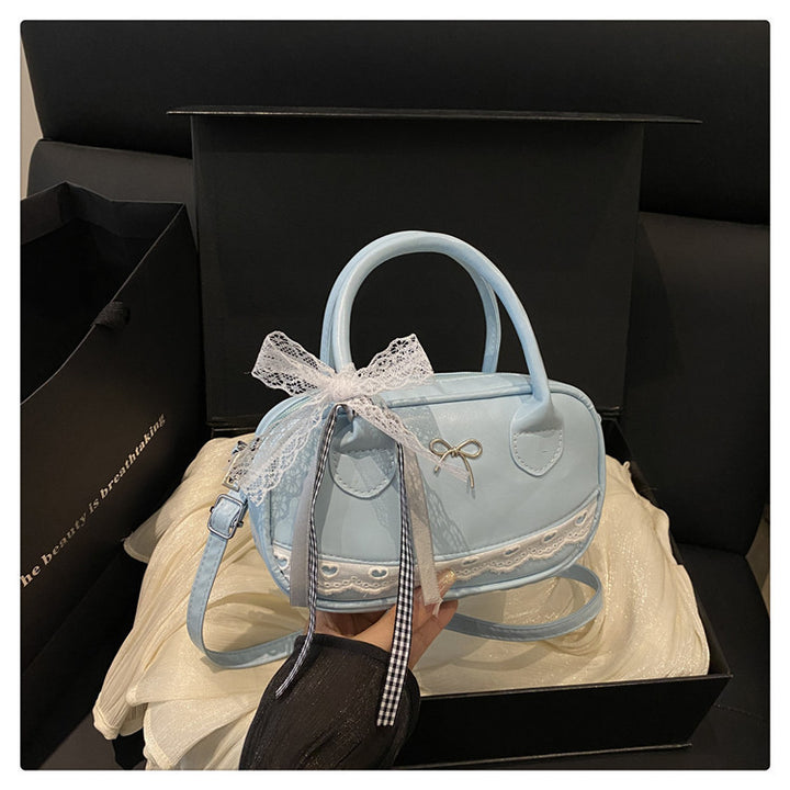 Elegant Lace-Trimmed Bow Handbag Stornfield