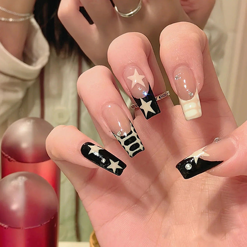 Artistic Nail Extensions with Star and Animal Design Stornfield