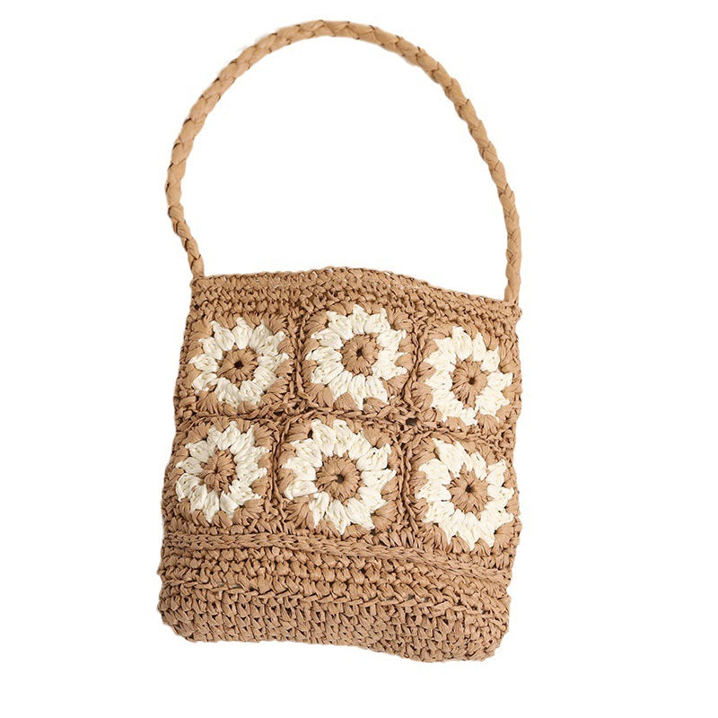 Handcrafted straw bag with floral patterns Stornfield