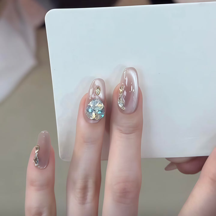 Glamorous artificial nails with rhinestone embellishments Stornfield