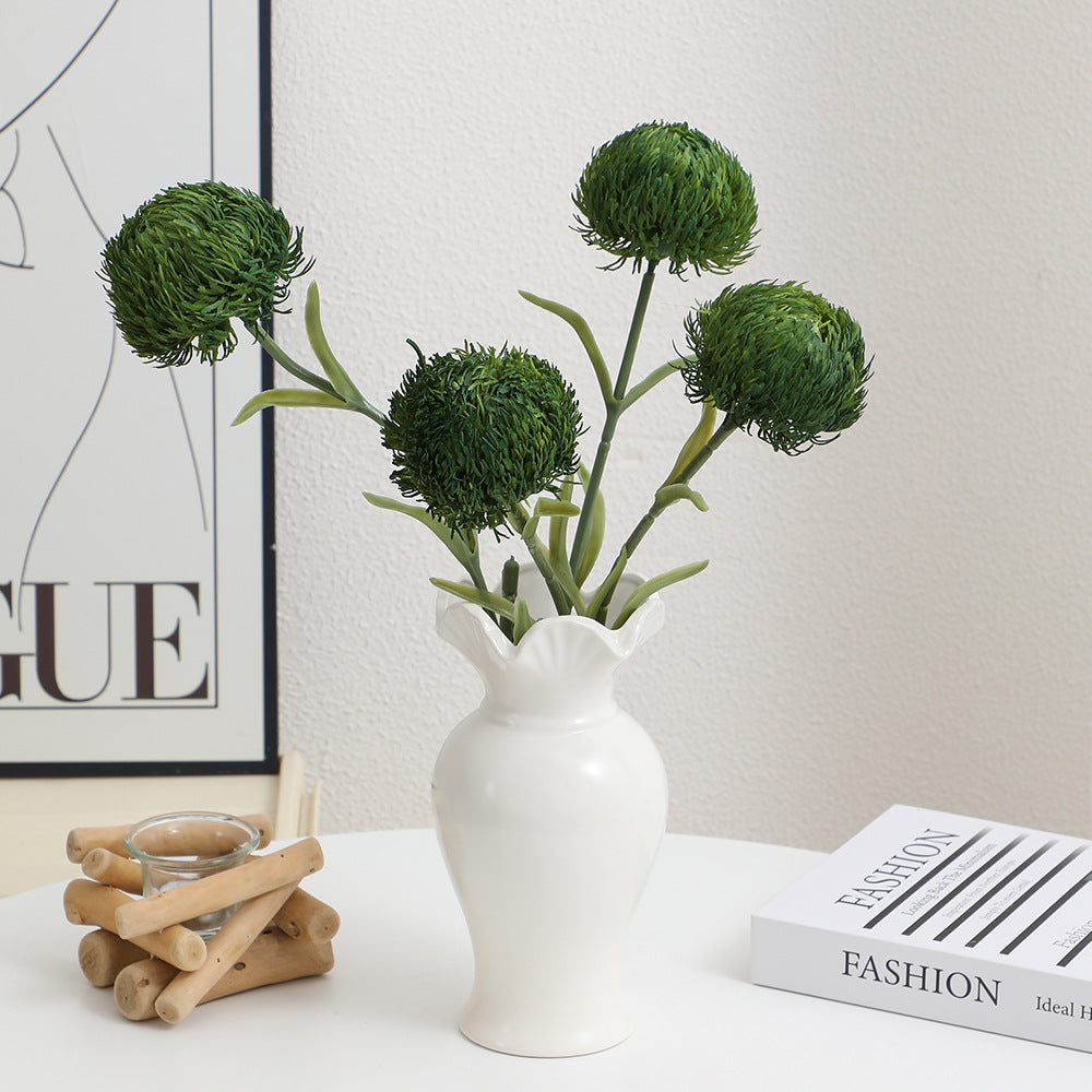 Decorative artificial flower branch with a natural appearance