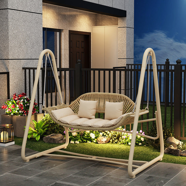 Woven rattan outdoor swing loveseat with padded cushions and powder-coated steel frame Stornfield
