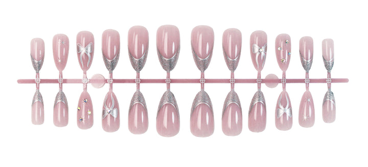 Artificial nail set with glamorous glitter and flower accents Stornfield