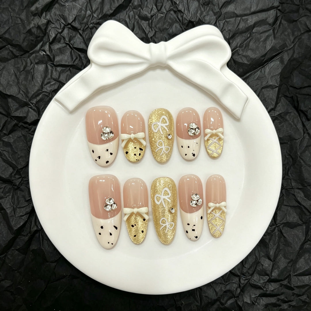 Artistic Press-On Nail Art Set with Charming Bow and Gem Accents