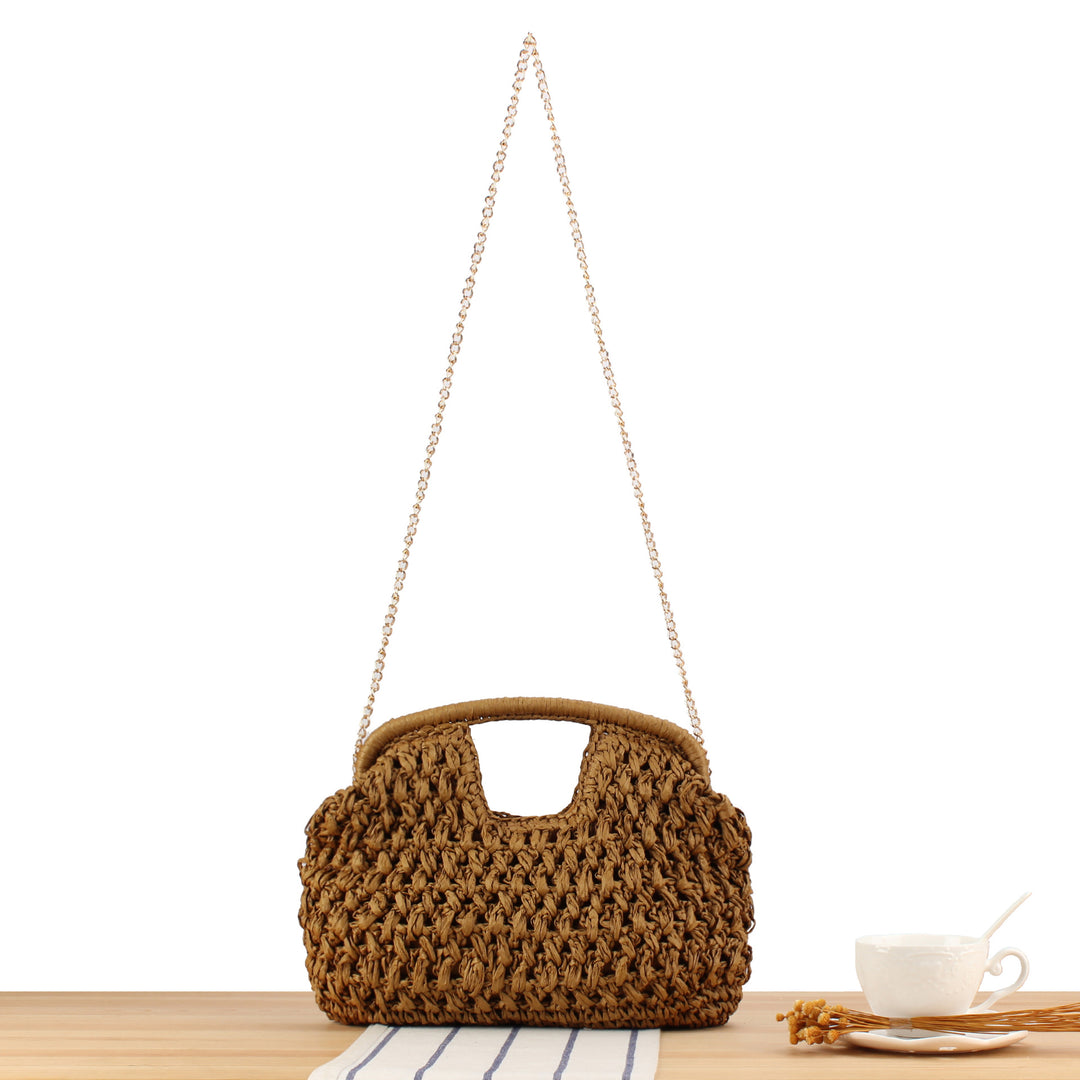 Fine straw shoulder bag with elegant chain accents Stornfield