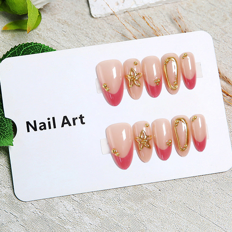 Artful nail tips with delicate gold accents Stornfield