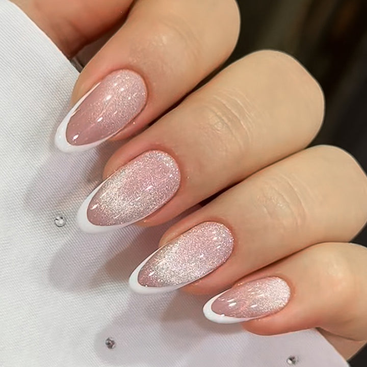 Artificial nail tips with glitter and elegant shape Stornfield