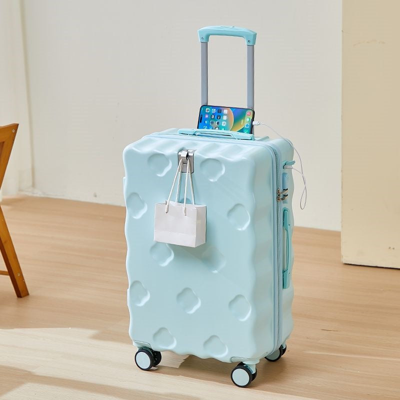hard-shell carry-on suitcase with integrated foldable cup holder phone cradle USB charging port and external bag hooks Stornfield