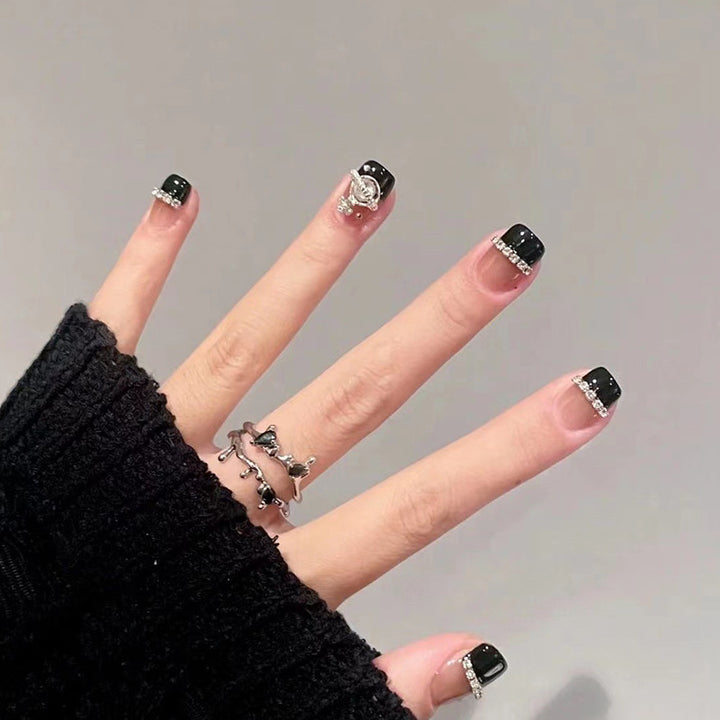 Glamorous artificial nail set with sparkling crystal embellishments Stornfield