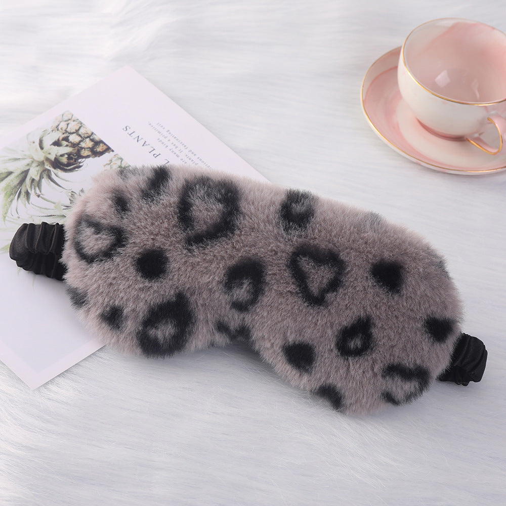 Women's cuddly faux fur sleep mask with heart-embossed surface and gathered comfort band Stornfield