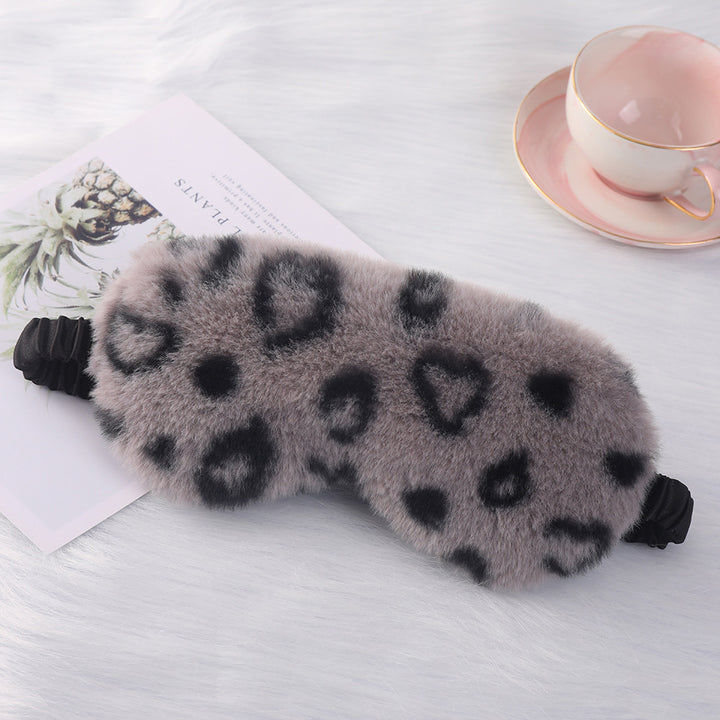 Women's cuddly faux fur sleep mask with heart-embossed surface and gathered comfort band Stornfield