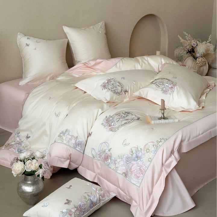 Luxurious floral embroidered cotton satin bedding set with ruffle and decorative pillow Stornfield