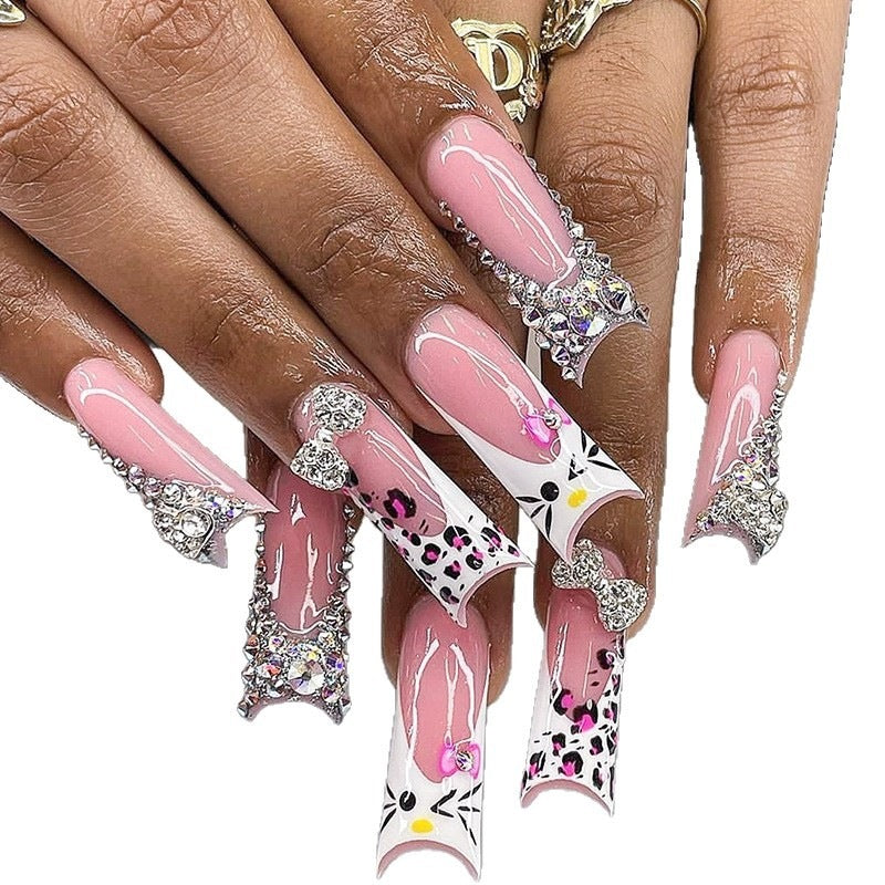Glamorous artificial nail set with 3D bows and glitter details Stornfield