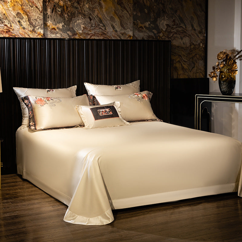 Luxurious Embroidered Satin Duvet Cover Set with Floral Border and Decorative Pillowcases