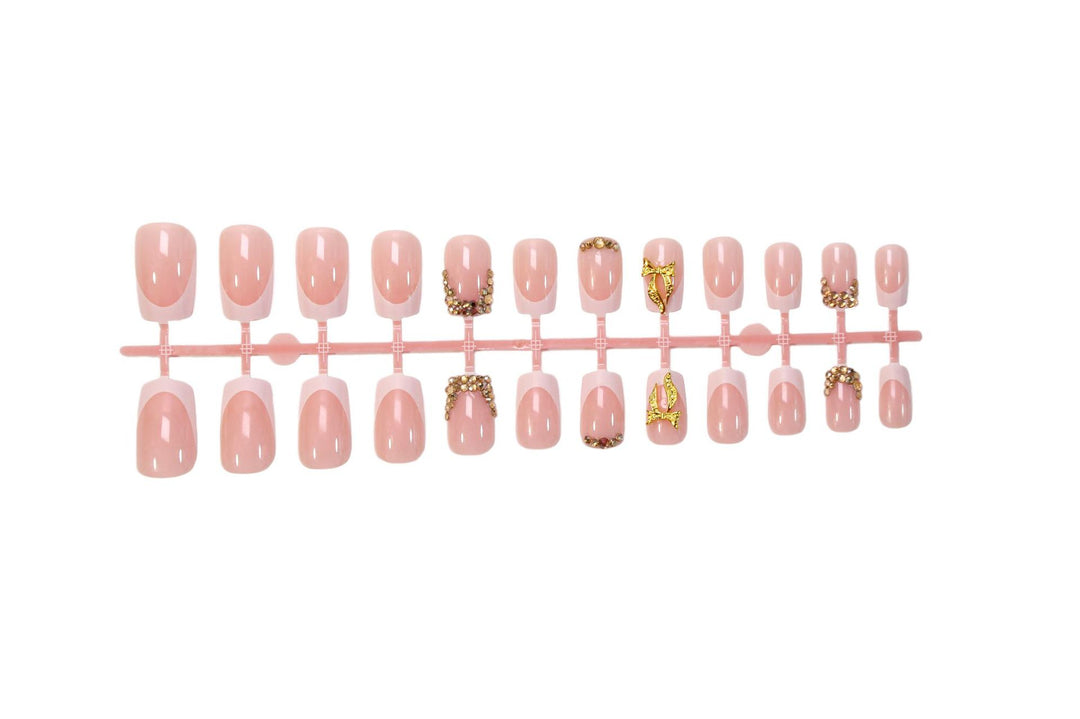 Nail art set with elegant glitter ornaments and stylish French tips Stornfield