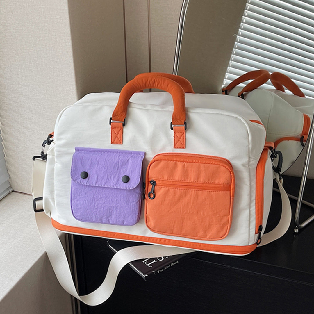 Sporty travel bag with multifunctional outer pockets Stornfield