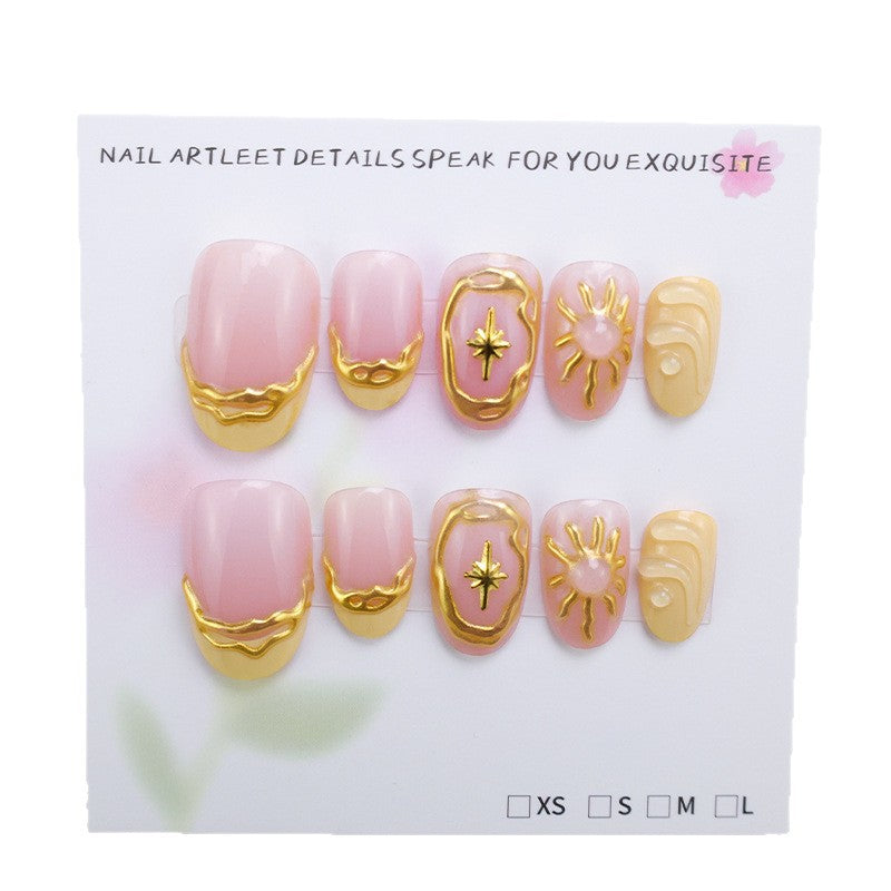 Acrylic nail set with elegant gold embellishments and creative designs Stornfield