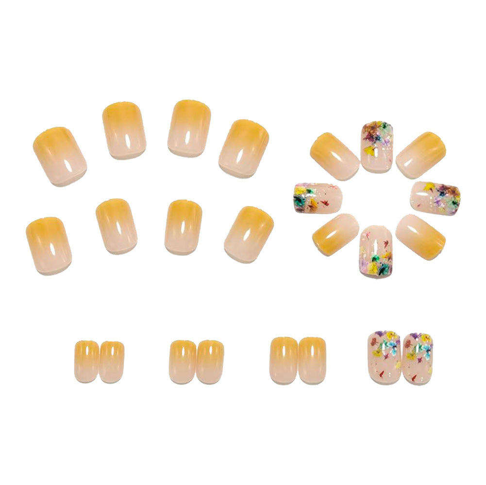 Artificial nails with floral design and glitter accents Stornfield