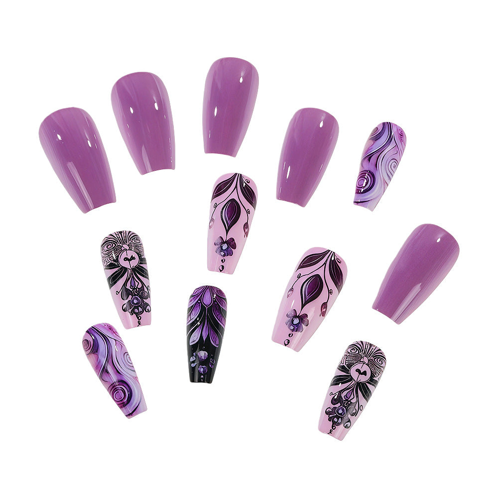 Artificial nails with intricate purple pattern Stornfield