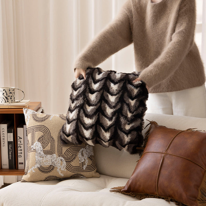 Rectangular decorative cushion made of faux fur with chevron relief and cozy filling