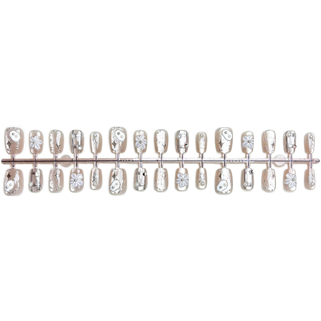 Artistic Press-On Nail Set with Floral and Metallic Accents