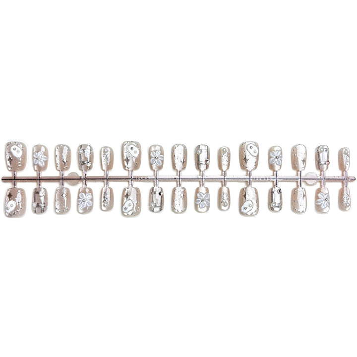 Artistic Press-On Nail Set with Floral and Metallic Accents