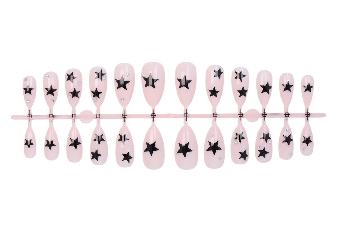 Nail art set with playful star designs Stornfield
