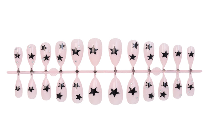 Nail art set with playful star designs Stornfield