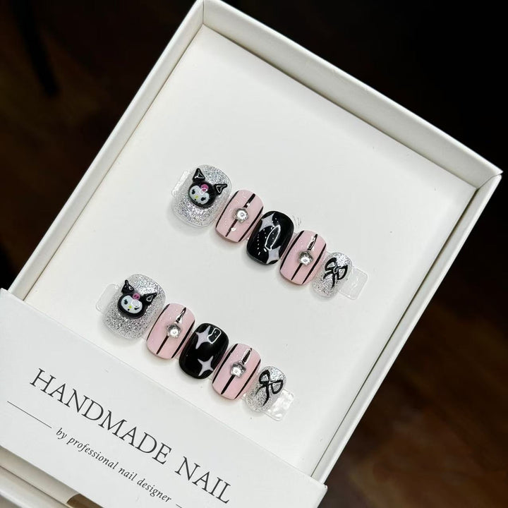 Whimsical Press-On Nail Art Set with Cat and Bow Accents