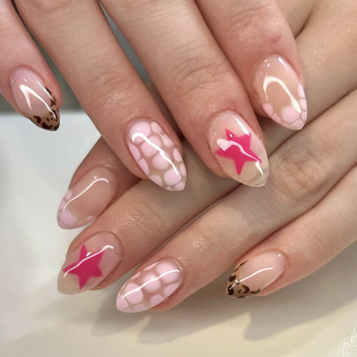 Artificial nail art with playful dots and bows Stornfield