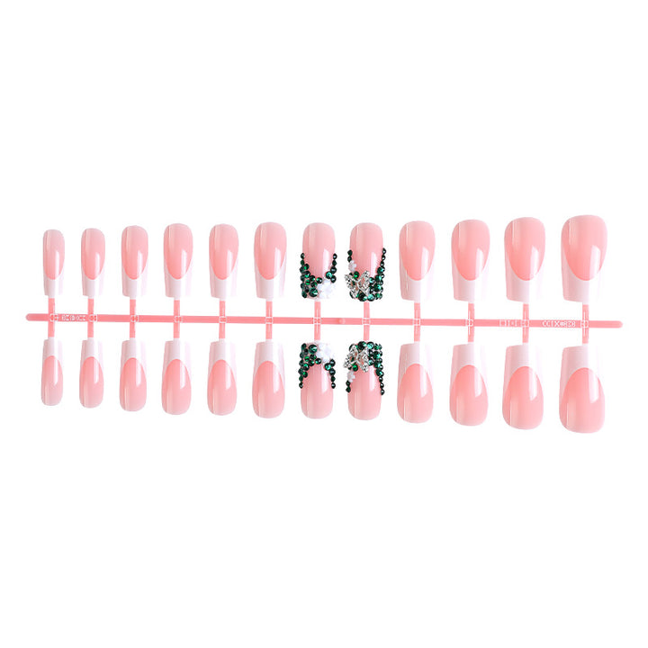 Acrylic nail set with elegant rhinestone decorations and floral design Stornfield