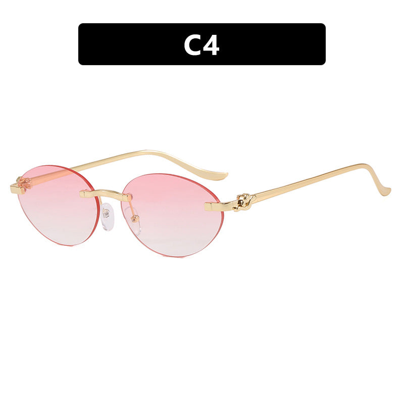 Women's elegant oval sunglasses with golden accents Stornfield