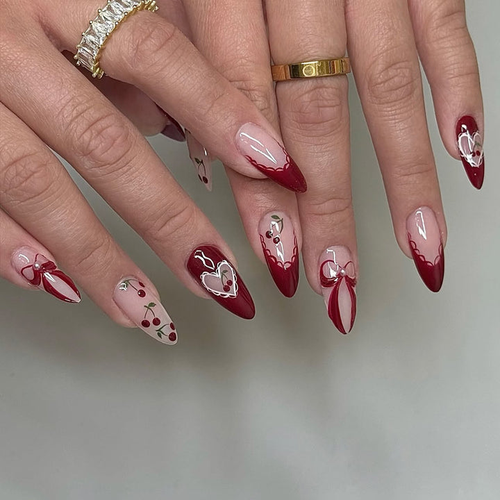 Creative nail set with romantic heart and bow accents Stornfield