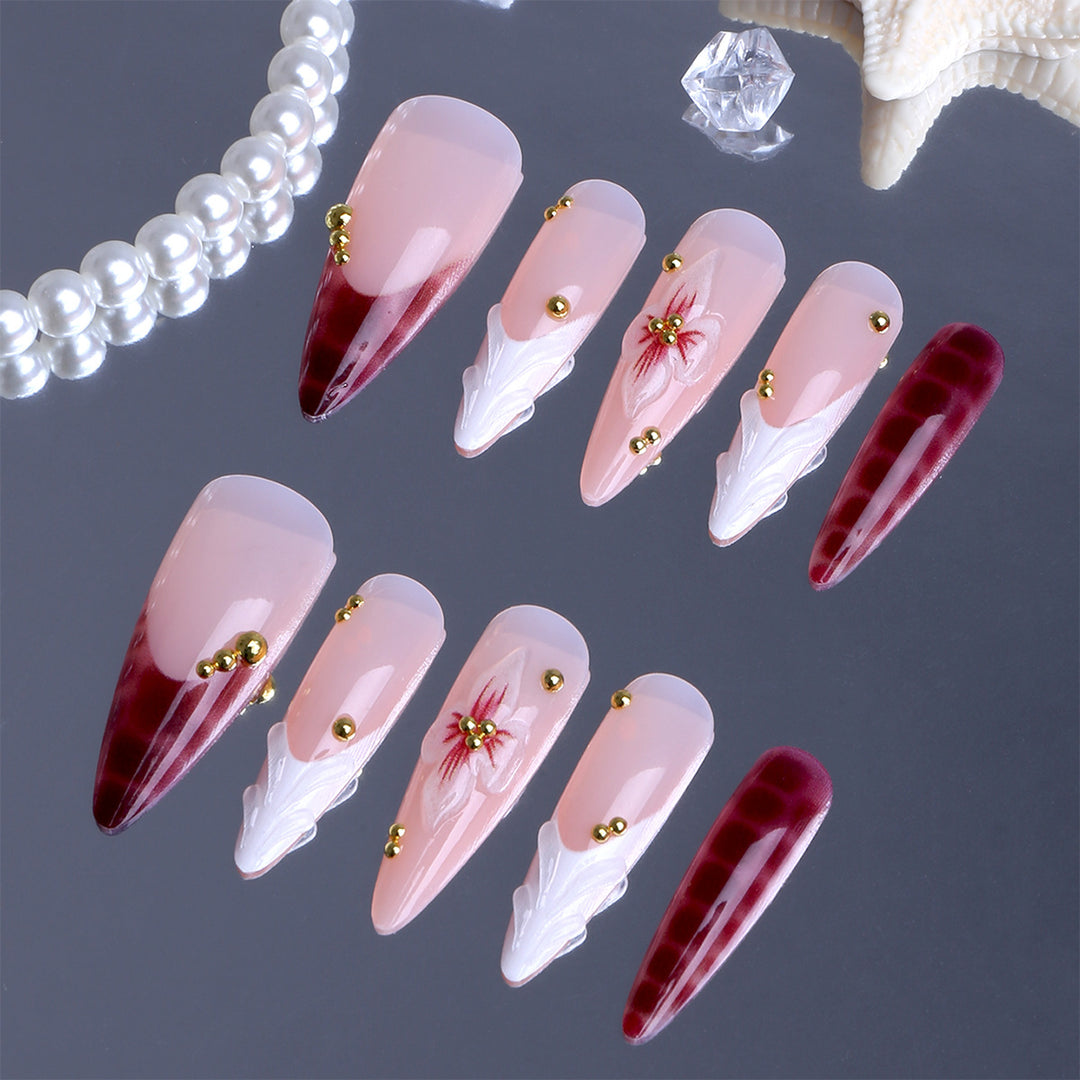 Artificial Nails in Elegant Modern Stiletto Style with Floral Design and Golden Accents Stornfield
